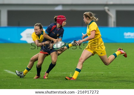 NANJING, CHINA-AUGUST 18: Australia Rugby Team (yellow) plays against Spain Rugby Team (red) during Day 2 match of 2014 Youth Olympic Games on August 18, 2014 in Nanjing, China.