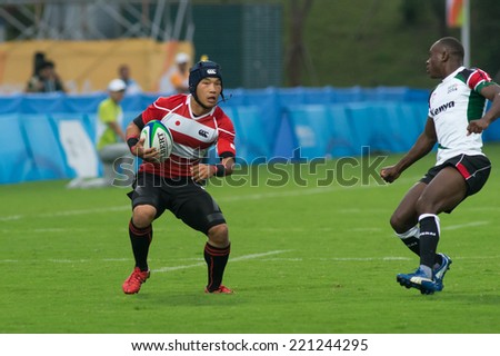 NANJING, CHINA-AUGUST 18: Kenya Rugby Team (white/green) plays against Japan Rugby Team (red/white) during Day 2 match of 2014 Youth Olympic Games on August 18, 2014 in Nanjing, China.