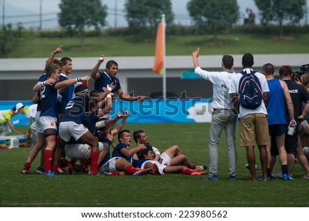 NANJING, CHINA-AUGUST 20: France rugby team celebrates their victory after winning the gold medal match of 2014 Youth Olympic Games on August 20, 2014 in Nanjing, China.