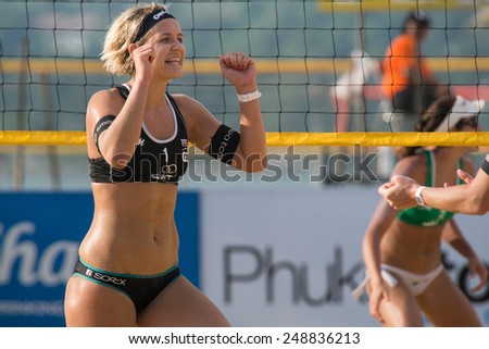 PHUKET, THAILAND-NOVEMBER 1: Laura Ludwig of Germany reacts after winning a point during a match on Day 3 of Phuket Open on November 1, 2013 at Karon Beach in Phuket, Thailand