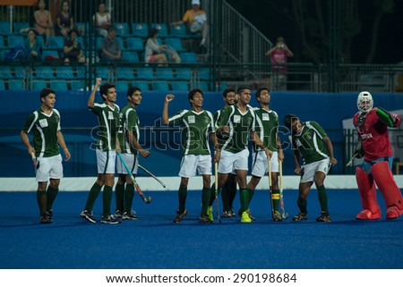 NANJING, CHINA-AUGUST 21: Pakistan Hockey Team (green) during Day 5 match against New Zealand Hockey Team at 2014 Youth Olympic Games on August 21, 2014 in Nanjing, China.