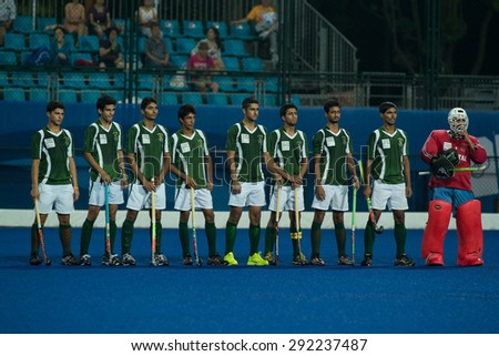 NANJING, CHINA-AUGUST 21: Pakistan Hockey Team (green) prepares for a match during Day 5 match against New Zealand Hockey Team at 2014 Youth Olympic Games on August 21, 2014 in Nanjing, China.