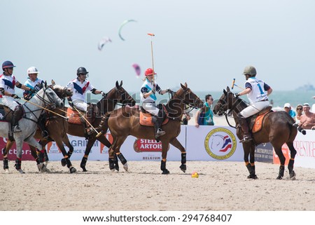 HUA HIN, THAILAND - APRIL 19: France Polo Team (white-red) plays against Thai Polo Team (white-blue) during 2014 Beach Polo Asia Championship on April 19 2014 in Hua Hin, Thailand.