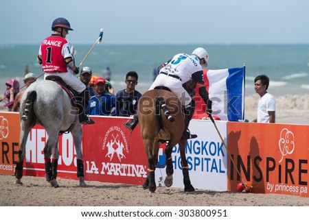 HUA HIN, THAILAND - APRIL 19: France Polo Team (white-red) plays against Thai Polo Team (white-blue) during 2014 Beach Polo Asia Championship on April 19 2014 in Hua Hin, Thailand.