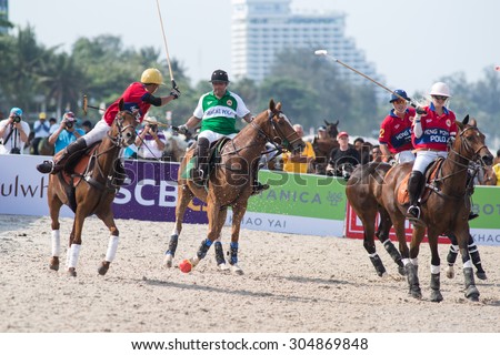 HUA HIN, THAILAND - APRIL 19: Hong Kong Polo Team (red) plays against Macau Polo Team (white-green) during 2014 Beach Polo Asia Championship on April 19 2014 in Hua Hin, Thailand.