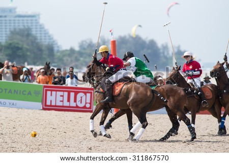 HUA HIN, THAILAND - APRIL 19: Hong Kong Polo Team (red) plays against Macau Polo Team (white-green) during 2014 Beach Polo Asia Championship on April 19, 2014 in Hua Hin, Thailand.