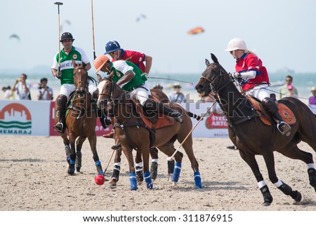 HUA HIN, THAILAND - APRIL 19: Hong Kong Polo Team (red) plays against Macau Polo Team (white-green) during 2014 Beach Polo Asia Championship on April 19, 2014 in Hua Hin, Thailand.