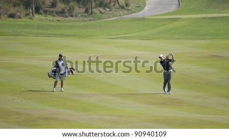 CHONBURI THAILAND - DECEMBER 15: British golfer Lee Westwood in action during Day 1 of Thailand Golf Championship on December 15, 2011 at Amata Spring Country Club in Chonburi, Thailand