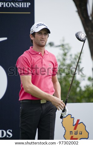 CHONBURI, THAILAND - DECEMBER 15: Gregory Bourdy of France in action during Day 1 of Thailand Golf Championship on December 15, 2011 at Amata Spring Country Club in Chonburi, Thailand