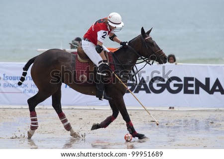 HUA HIN, THAILAND - APRIL 7: C. Zeisberger of India Polo Team in action during the 2012 Beach Polo Asia Championship on April 7, 2012 in Hua Hin, Thailand. India Polo Team wins 6-2.