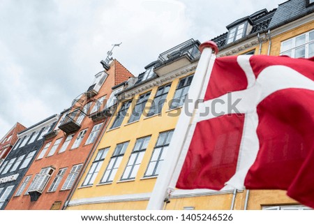 Similar – Image, Stock Photo Danish flag at dawn waving in the wind