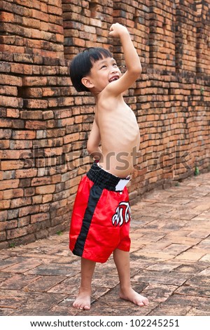 Thai boxing-letters on the pants not Contains potential trademark or copyright infringement but Thai language is name \