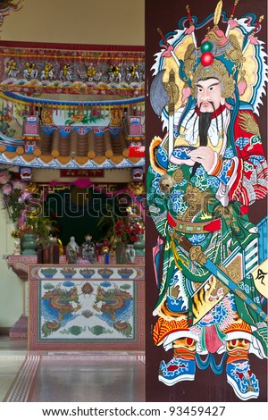 Traditional type of temple gate in China Town Thailand. God of China on the door