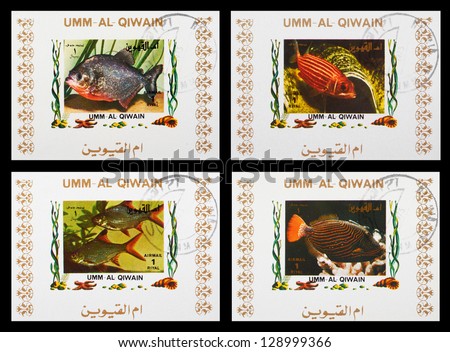 UMM AL-QUWAIN - CIRCA 1973: A set of postage stamps printed in UMM AL-QUWAIN shows aquarium fish, series, circa 1973