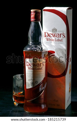 RUSSIA - MARCH 28, 2014: A Glass of Dewar`s scotch whisky.