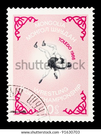 MONGOLIA - CIRCA 1966 : A post stamp printed in Mongolia shows Wrestling World Championship in Toledo, circa 1966