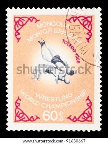 MONGOLIA - CIRCA 1966 : A post stamp printed in Mongolia shows Wrestling World Championship in Toledo, circa 1966
