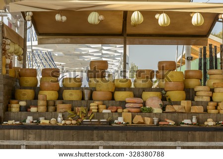 MILAN, ITALY - August 05: EXPO 2015,  exhibition of mock-ups of dairy food in a wooden stall at Decumano walk, shot  on aug 05 2015  Milan, Italy