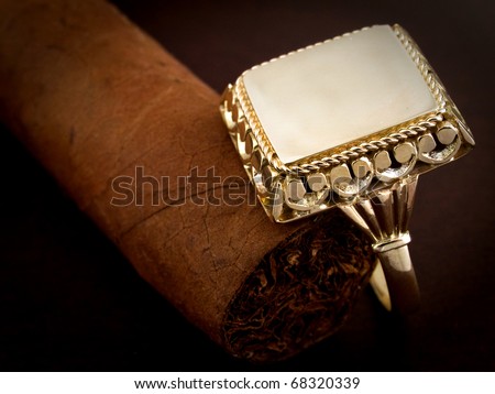 male gold signet ring whit cigar