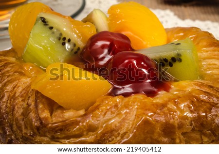 Image of mixed fruit danish pastry in white dish