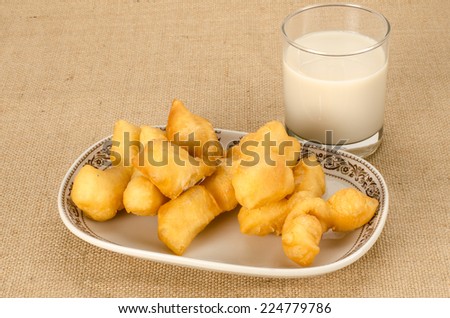 Image of Thai fried dough stick in ceramic dish
