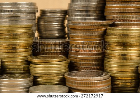 Stack of coins on brown sack background