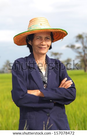 Thai women farmer in the rice field