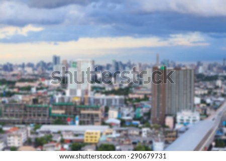 Background with blurred aerial view with skyline and blue sky
