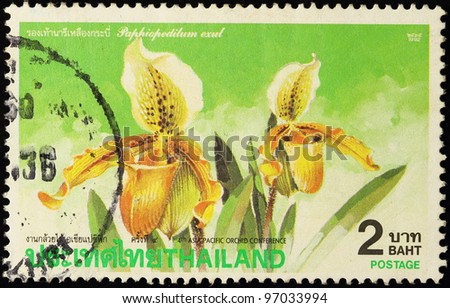 THAILAND - CIRCA 1992: A 4th Asia Pacific Orchid Cinference stamp printed in Thailand shows paphiopedilum exul, circa 1992.