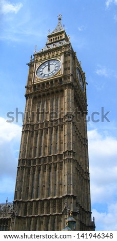 Big Ben clock Tower striking 12 o'clock in London, England, UK