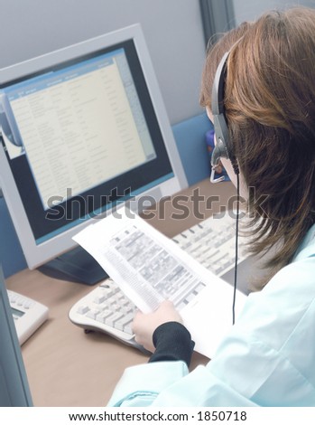 Girl talking online in the Call centre