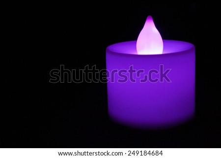 Purple electric candle glow in the dark.