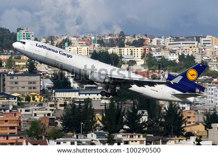 QUITO, ECUADOR - JUNE 16, 2011: A Lufthansa Cargo MD-11F jet aircraft takes off on June 16, 2011 in Quito, Ecuador. Lufthansa Cargo is the world's second largest cargo airline with 18 planes.