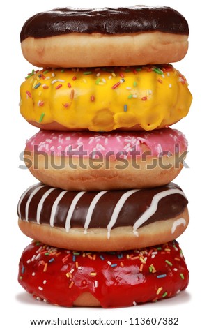 Collection of many colorful donuts one upon another