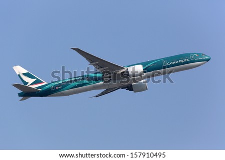HONG KONG - SEPTEMBER 26: A Cathay Pacific Boeing 777 takes off on September 26, 2013 in Hong Kong. Cathay Pacific is the flag carrier airline of Hong Kong. It operates with 144 aircraft.