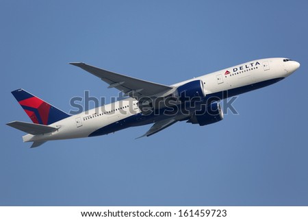 HONG KONG - SEPTEMBER 26: A Delta Boeing 777 takes off on September 26, 2013 in Hong Kong. Delta Air Lines is the world\'s largest airline with 733 planes and 160 million passengers in 2012.