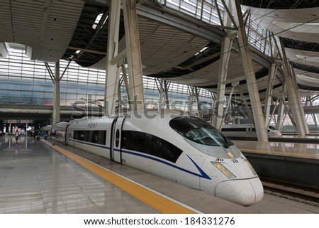 BEIJING - SEPTEMBER 18: The high-speed train CRH3 in the South Railway Station on September 18, 2013 in Beijing. The CRH3 is a version of the Siemens high-speed train similar to the German type ICE3.