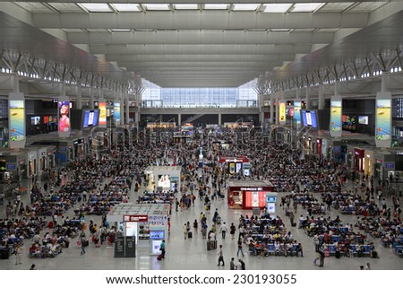 SHANGHAI - SEPTEMBER 19: Inside view of the Hongqiao Railway Station on September 19, 2013 in Shanghai. It was opened in 2010 and is Asia\'s largest railway station.