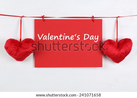 Greeting card on Valentine\'s day with copyspace for your own text and two hearts