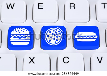Ordering pizza hamburger online fast food order delivery fastfood internet on computer