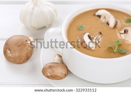 Mushroom soup meal with fresh mushrooms food in bowl