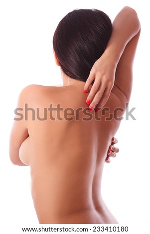 beautiful sexy naked woman girl sun-tanned body,holding back with hands, back pain ache, isolated
