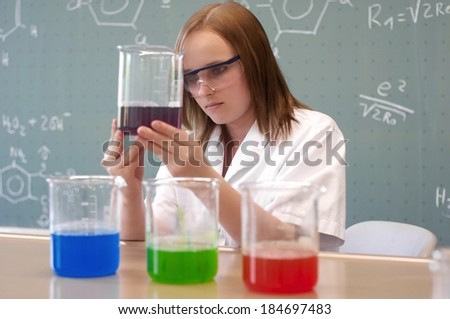 Woman examining an experiment in the laboratory