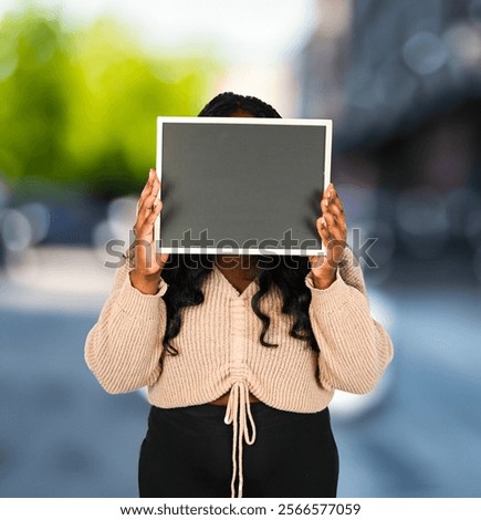 Similar – Image, Stock Photo Cheerful black woman covering eye