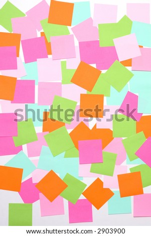 many sticky notes on white wall