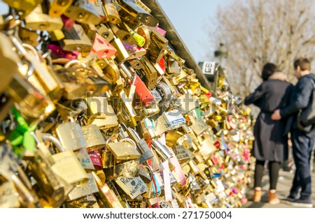 PARIS, FRANCE MARCH 17- 2015: Love locks on the bridge \