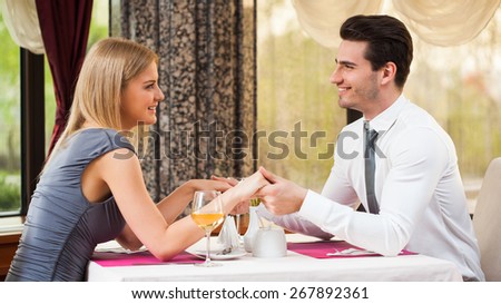 Happy couple having great time at the restaurant