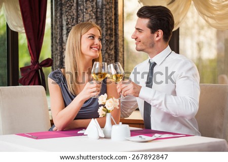 Happy couple having great time at the restaurant