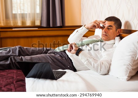 Businessman realizing that he is going to be late