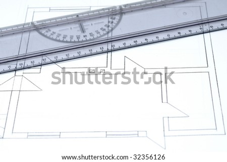 Architectural blueprint and ruler
